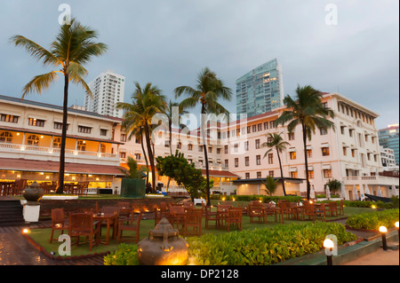 Galle Face Hotel, built in 1864, with palm trees in the evening, Colombo, Sri Lanka Stock Photo