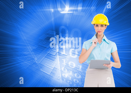 Composite image of thoughtful attractive architect holding clipboard Stock Photo