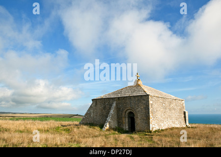 A view of St Aldhelm's Chapel on St Aldhelm's Head, on the Jurassic Coast in Dorset UK. Also called St Alban's Head Stock Photo