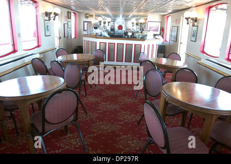 May 23, 2006; New Orleans, LA, USA; Empty tables in the bar of the steamboat Natchez on a riverboat tour on the Mississippi River. The Natchez is the only one of the New Orleans paddlewheelers currently in operation, yet it makes many of its hour-long cruises with only 10 percent of its normal passenger load. Before Katrina, there were three paddlewheelers open to tourists.April 14 Stock Photo