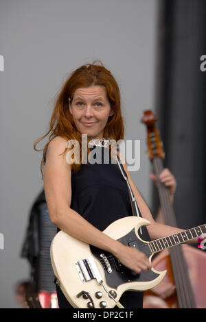 Neko case deals tenor guitar