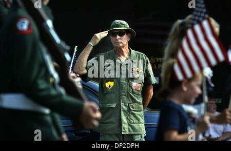 May 29, 2006; Stuart, FL, USA; Vietnam veteran Bruce Hudson of Ft. Pierce salutes from the side of East Ocean Blvd. while parade participants in the annual Stuart Memorial Day parade pass by him monday morning.  Mandatory Credit: Photo by David Spencer/Palm Beach Post/ZUMA Press. (©) Copyright 2006 by Palm Beach Post Stock Photo