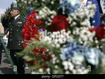 May 29, 2006; San Antonio, TX, USA; Thomas M. Fajardo salutes Monday morning May 29, 2006 during Memorial Day services at Ft. Sam Houston National Cemetery. Fajardo, who served in the military for 22 years, was representing the Disabled American Veterans during the ceremonies. Mandatory Credit: Photo by William Luther/San Antonio Express-News/ZUMA Press. (©) Copyright 2006 by San A Stock Photo