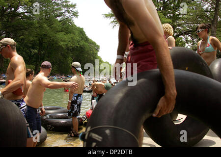 May 29, 2006; Gruene, TX, USA; Jon Myers of College Station loads his tube into the Guadalupe River in Gruene, Texas that packed with young and old for Memorial Day Monday May 29, 2006. Mandatory Credit: Photo by Kevin Geil/San Antonio Express-News/ZUMA Press. (©) Copyright 2006 by San Antonio Express-News Stock Photo