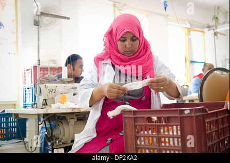 EGYPT, BELBEIS: Many young women work at Naturetex factory at SEKEM. Often they stop working when they get married. Stock Photo