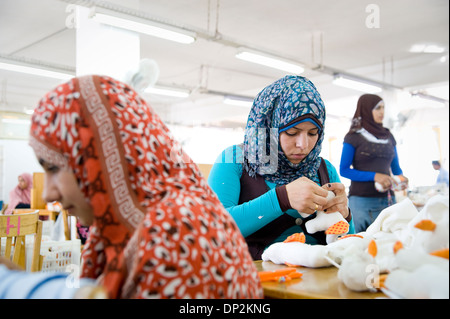 EGYPT, BELBEIS: Many young women work at Naturetex factory at SEKEM. Often they stop working when they get married. Stock Photo