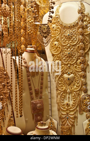 Gold jewelry in shop window of gold souk, Dubai, United Arab Emirates Stock Photo