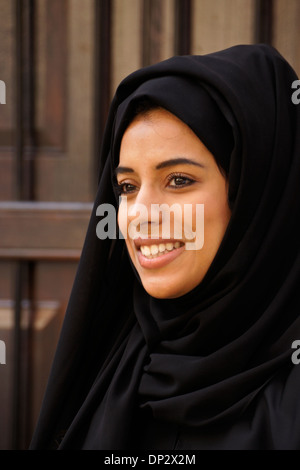 Beautiful Muslim woman with head covered, Dubai, United Arab Emirates Stock Photo