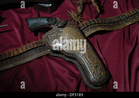Jun 15, 2006; Fredericksberg, TX, USA; Colt double action 41 Cal,4 1/2 ' barrel with original cactus weave holster and belt with Mexican Eagle belonging to Pacnho Villa's son called Puto Villa. The colt and gun rig will be sold as one lot. Mandatory Credit: Photo by Delcia Lopez/San Antonio Express-News/ZUMA Press. (©) Copyright 2006 by San Antonio Express-News Stock Photo