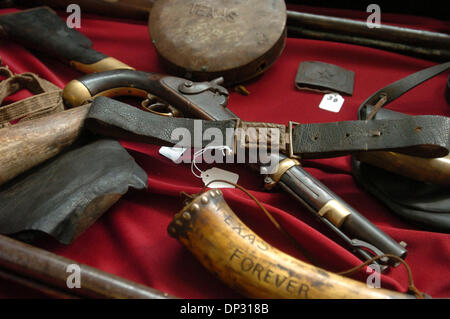 Jun 15, 2006; Fredericksberg, TX, USA; Texas Confederate items including a canteen marked 'Texas' along with steer horn Powder horn with engraving'Texas Forever' on the auction block this weekend at the Trois Estate in Frederickburg, Texas. Mandatory Credit: Photo by Delcia Lopez/San Antonio Express-News/ZUMA Press. (©) Copyright 2006 by San Antonio Express-News Stock Photo