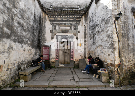 Art students in old town of Hongcun, Anhui, China Stock Photo