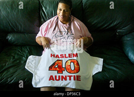 Jun 22, 2006; Miami, FL, USA; Jackie Newsom, the aunt of Miami Heat forward Udonis Haslem, sits inside her home in Miami's Liberty City area where Haslem spent a lot of time during his teenage years.  Newsom is extremely close to Haslem and the two talk on the phone together numerous times each day.    Mandatory Credit: Photo by Damon Higgins/Palm Beach Post/ZUMA Press. (©) Copyrig Stock Photo