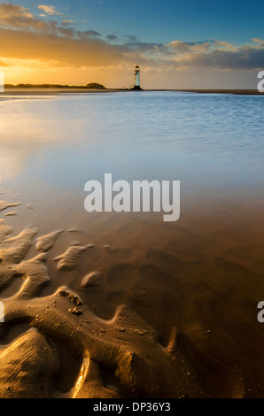 Beautiful Sunset during new years eve 2013 at the point of Ayr lighthouse on Talacre beach, North Wales. Stock Photo
