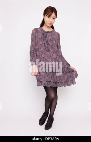 Young woman wearing one piece dress