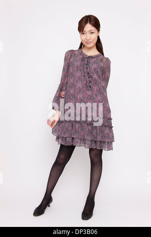 Young woman wearing one piece dress