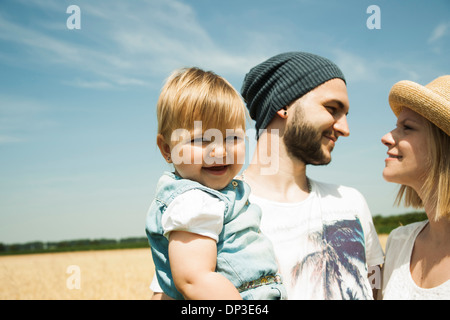 Portrait of Family by Agricultural Field, Mannheim, Baden-Wurttemberg, Germany Stock Photo