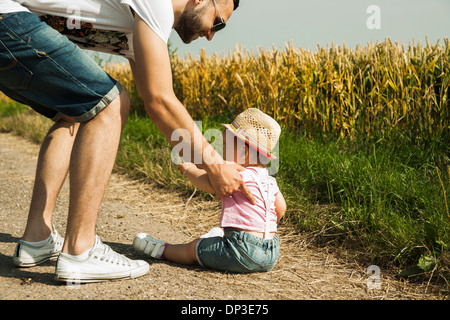 Father with Baby Daughter Outdoors, Mannheim, Baden-Wurttemberg, Germany Stock Photo