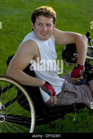 Jul 06, 2006; Sacramento, CA, USA; Dominic Cooke takes a break while he cycles on the American River Bike Trail, Wednesday, July 6, 2006. Cooke is a former star of the Cal Berkeley rugby team before he was paralyzed in a car accident in December 2001. Cooke will be participating in Eppie's Great Race on July 15.  Mandatory Credit: Photo by Lezlie Sterling/Sacramento Bee/ZUMA Press. Stock Photo