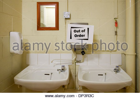 out of order sign on hot water heater above washbasins in toilet restroom bathroom - Bathroom Out Of Order out of order sign on hot water heater above washbasins in toilet restroom bathroom - Bathroom Out Of Order