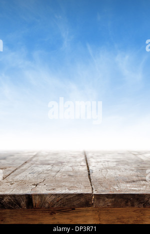 Empty table against blue sky as background for product placement Stock Photo