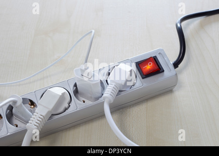 Close-up of electrical plug and socket, power bar, Germany Stock Photo