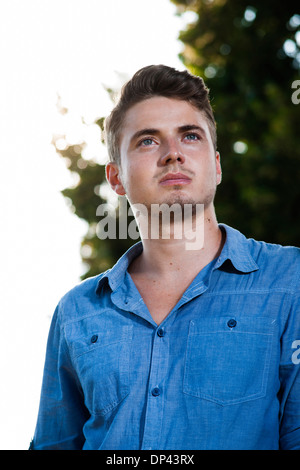 Portrait of young man outdoors, Germany Stock Photo