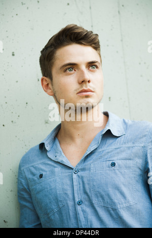 Portrait of young man outdoors, Germany Stock Photo