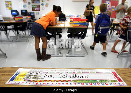 Aug 15, 2006; Boca Raton, FL, USA; Students wonder their new classroom and locate their desks with first-year 2nd-grade teacher Paige Schildkraut during Meet the Teacher Day at Addison Mizner Elementary School in Boca Raton Tuesday, Aug. 15, 2006. Meet the Teacher Day was Wed. and Paige got to meet many of her students for the first time and introduce herself to their parents. Mand Stock Photo