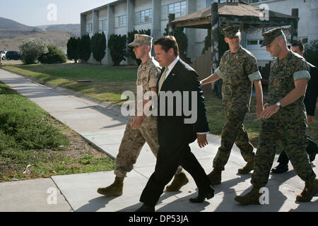 Aug 30, 2006; Camp Pendleton, CA, USA; Marine Cpl. MARSHALL MAGINCALDA, front left, walks to the building where his 9:00 a.m. Article 32 Investigation hearing will occur. Next to him is his lawyer JOSEPH LOW. Behind are other members of his defense team. Mandatory Credit: Photo by Charlie Neuman/SDU-T/ZUMA Press. (©) Copyright 2006 by SDU-T Stock Photo