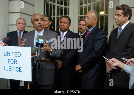 Sep 05, 2006; Manhattan, NY, USA; Congressman CHARLES RANGEL (L) speaks as CHARLIE KING (4th from R) and ANDREW CUOMO (R) look on. Charlie King, candidate for New York state attorney general, announces his support for rival Andrew Cuomo in a press conference on the steps of City Hall. King, joined by Congressman Charles Rangel and other supporters also announces 'United For Justice Stock Photo