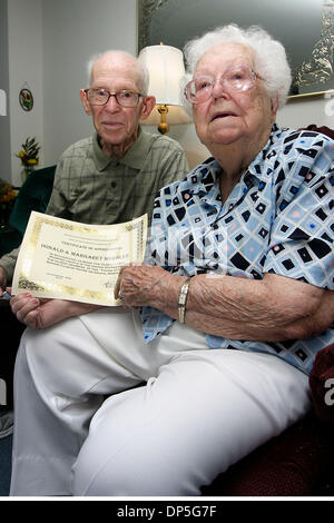 Sep 14, 2006; Havre de Grace, MD, USA; DONALD and MARGARET MERGLER, who celebrated their 80th Anniversary at the beginning of this month, with a certificate of appreciation from Harford county in recognition of being the oldest married couple in the United States in their home in Havre de Grace on Thursday.   Mandatory Credit: Photo by James Berglie/ZUMA Press. (©) Copyright 2006 b Stock Photo