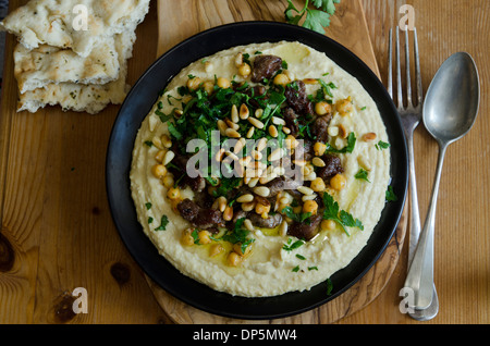 Hummus with lamb meat Stock Photo