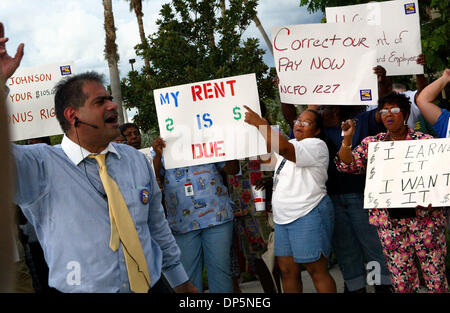 Sep 20, 2006; West Palm Beach, FL, USA; Bus drivers protested with signs and chants outside the school board office on Wednesday evening to complain about inaccurate paychecks and other problems. Shown here is Frank Sosa, of the Palm Beach County chapter of the National Conference of Firemen and Oilers, which represents school bus drivers, rousing the crowd.   Mandatory Credit: Pho Stock Photo