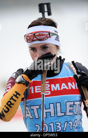 Ruhpolding, Germany. 07th Jan, 2014. German biathlete Andrea Henkel wipes over her nose during the training at the Biathlon World Cup at Chiemgau Arena in Ruhpolding, Germany, 07 January 2014. Photo: Tobias Hase/dpa/Alamy Live News Stock Photo