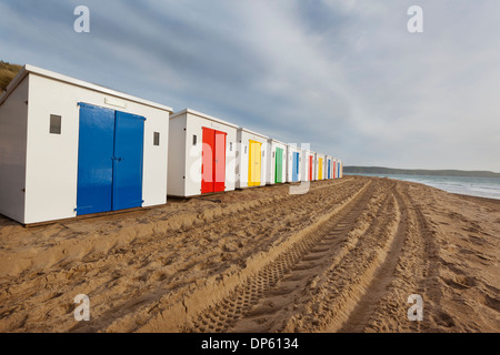 Beach huts in a row on Woolacombe Sands in North Devon, UK. Stock Photo