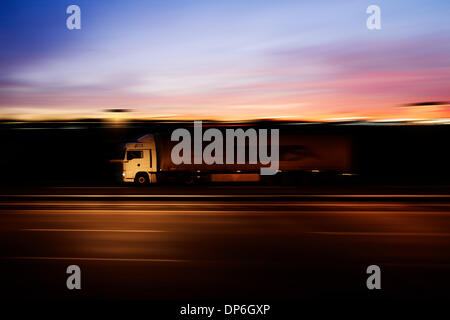 Berlin, Germany. 7th Jan, 2014. A truck driving on a highway on January 7, 2014 in Berlin, Germany. Photo: picture alliance / Robert Schlesinger/dpa/Alamy Live News Stock Photo