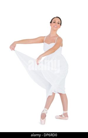 Smiling young ballet dancer posing Stock Photo