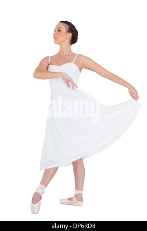 Focused young ballet dancer posing Stock Photo