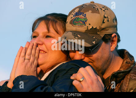Oct 25, 2006; Starke, FL, USA; Sandra Sundberg, with husband Don, of Gainesville, as the announcement is made that serial killer Danny Rolling had died.  Sundberg was friends with two of Rolling's victims, Christa Hoyt and Manny Taboada.  Supporters and demonstrators gather outside of the Florida State Prison in Starke, where convicted serial killer Danny Rolling was executed by le Stock Photo