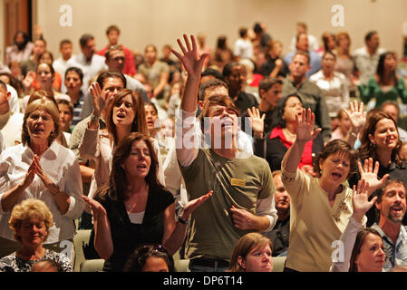 Oct 25, 2006; West Palm Beach, FL, USA; Chad Vaughan, with Christ Fellowship Church student ministry, sings during a special pre-ceremony in the new 1,100 seat sanctuary Wednesday evening.  The Church, inside the building of a former Target store, will hold its first services this Sunday. Mandatory Credit: Photo by Richard Graulich/Palm Beach Post/ZUMA Press. (©) Copyright 2006 by  Stock Photo