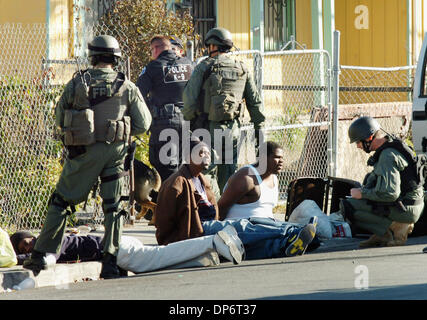 Oct 25, 2006; North Richmond, CA, USA; An FBI SWAT team detains a group of men after a raid focusing on suspected drug trafficking that included Richmond police and the Contra Costa County Sheriff's Office in North Richmond, California, on Wednesday, Oct. 25, 2006. Mandatory Credit: Photo by Mark DuFrene/Contra Costa Times/ZUMA Press. (©) Copyright 2006 by Contra Costa Times Stock Photo