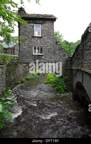 Bridge House over Stock Beck beside Rydal Road in Ambleside run by the National Trust, Lake District, Cumbria, England, UK Stock Photo