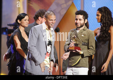 Nov 02, 2006; New York, NY, USA; Presenters JULIETA VENEGAS and SIN BANDERA stand behind CALLE 13 who won their 2nd Grammy for 'Best New Artist' during the 7th Annual Latin Grammy Awards held at Madison Square Garden. Mandatory Credit: Photo by Aviv Small/ZUMA Press. (©) Copyright 2006 by Aviv Small Stock Photo