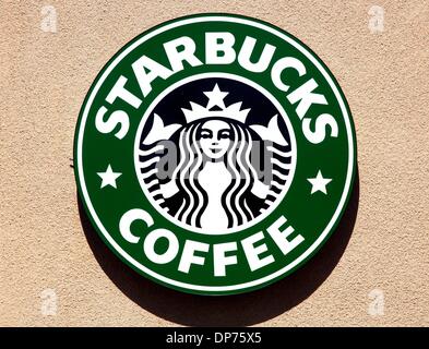 Oct 14, 2006; Dana Point, CA, USA; The coffee retailer, Starbucks already has 3,452 retail stores in the United States, and has stores in Barnes and Noble bookstores. Customers enjoy a cup of coffee while reading books and magazines. Founded in 1971, the company opened its first location in Seattle's Pike Place Market, went global in 1996 when it opened its first store in Singapore Stock Photo