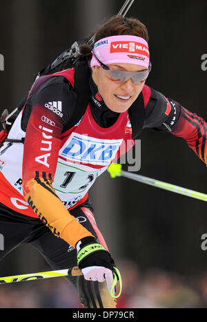 Ruhpolding, Germany. 08th Jan, 2014. Germany's Evi Sachenbacher-Stehle competes in the Women's 4x6 km relay competition during the Biathlon World Cup at the Chiemgau Arena in Ruhpolding, Germany, 08 January 2014. The German team took second place. Photo: TOBIAS HASE/dpa/Alamy Live News Stock Photo