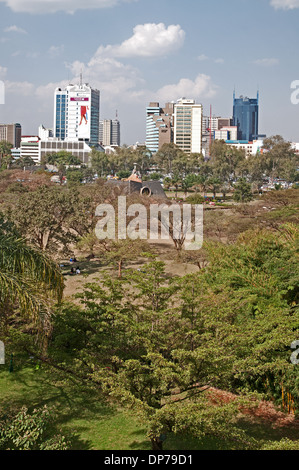 Nairobi city skyline with high rise multi storey buildings seen across Uhuru Park and Nyayo Monument from Nairobi Serena Hotel Stock Photo