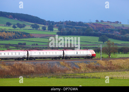 Class 390 Pendolino Virgin train near Plumpton on the West Coast Main Line Railway Cumbria England United Kingdom Great Britain Stock Photo