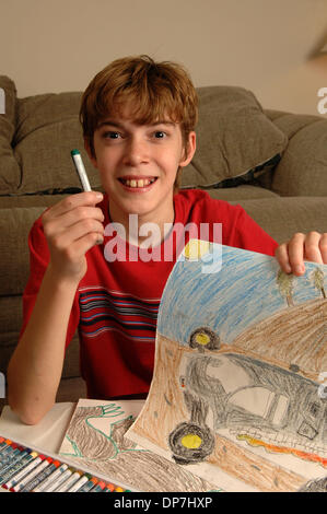 Nov 17, 2006; Lawrenceville, GA, USA; Young mentally challenged MATTHEW BENNETT, 8, with learning disability, with charcoal drawings. Mandatory Credit: Photo by Robin Nelson/ZUMA Press. (©) Copyright 2006 by Robin Nelson Stock Photo
