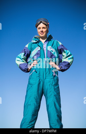 Woman wearing ski suit Stock Photo