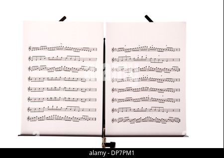 Melody sheets on a music sheet stand isolated in white Stock Photo